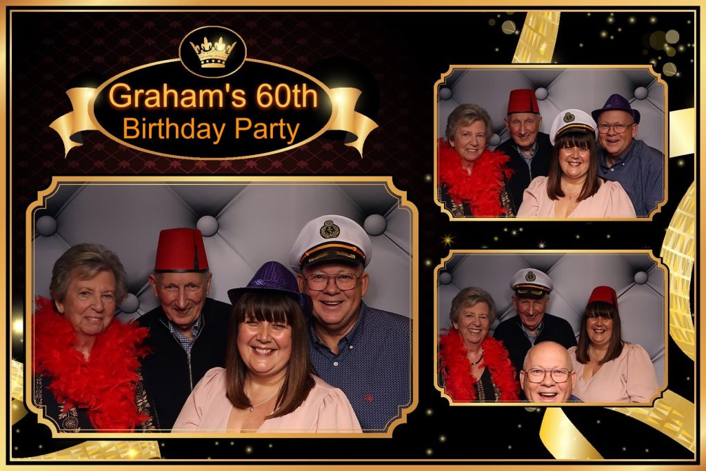 Guests posing with props and smiling for fun photo booth pictures at a 60th birthday in Portsmouth.