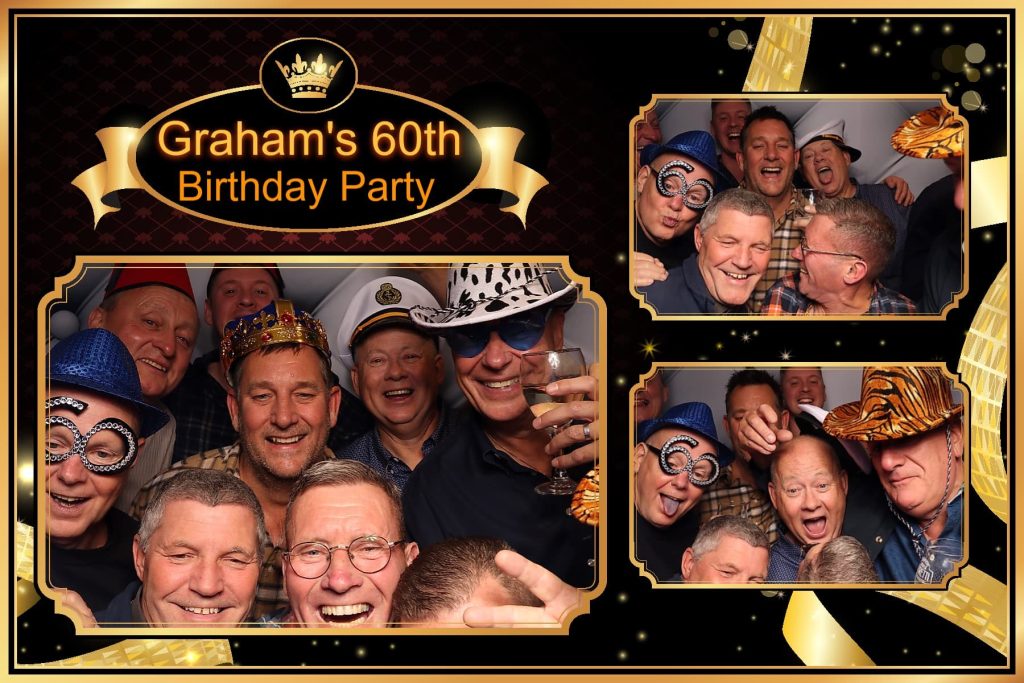 Large group of friends enjoying fun moments in a photo booth during a Portsmouth birthday celebration.