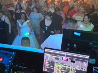 View from the DJ booth showing the bride and guests dancing at a Portsmouth wedding party with Heard The Beat.