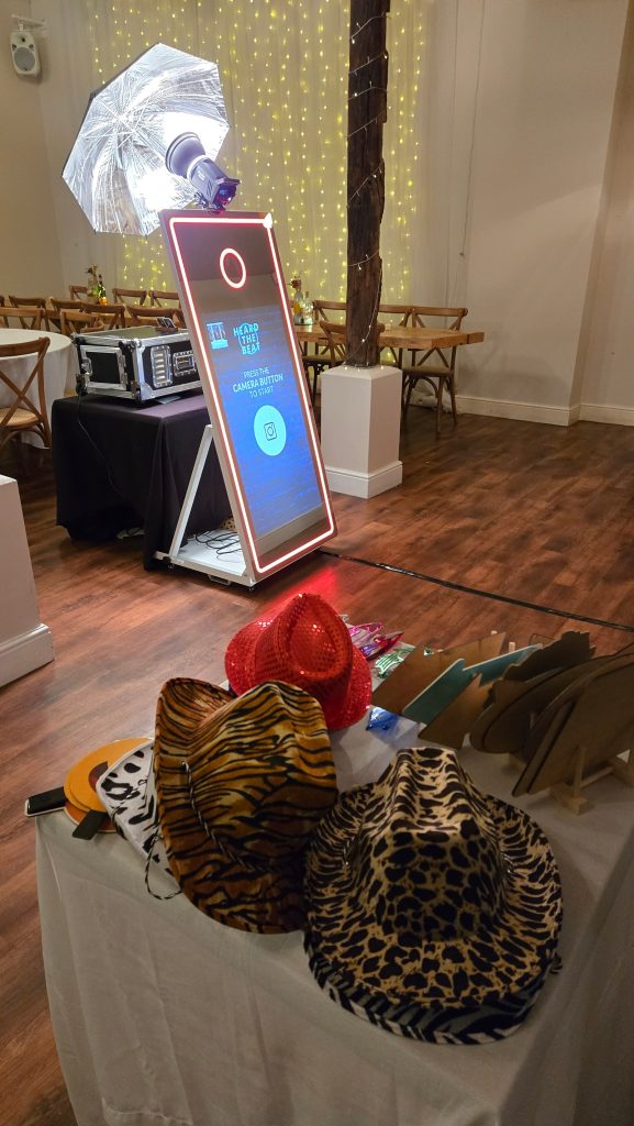 Magic mirror photo booth with fun props table at The Wickham Estate, Hampshire