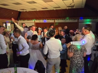 Evening wedding reception at The Pavilion Farlington with a full dancefloor and professional DJ setup by Heard The Beat