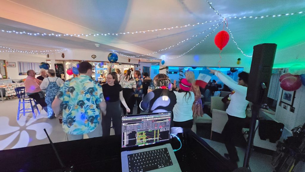 Guests dancing at a 30th birthday party with a DJ at Stokes Bay Sailing Club in Gosport