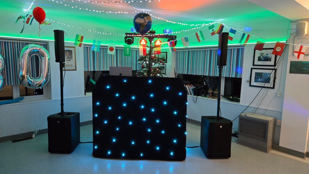 DJ setup at Stokes Bay Sailing Club for a 30th birthday party with professional sound and lighting