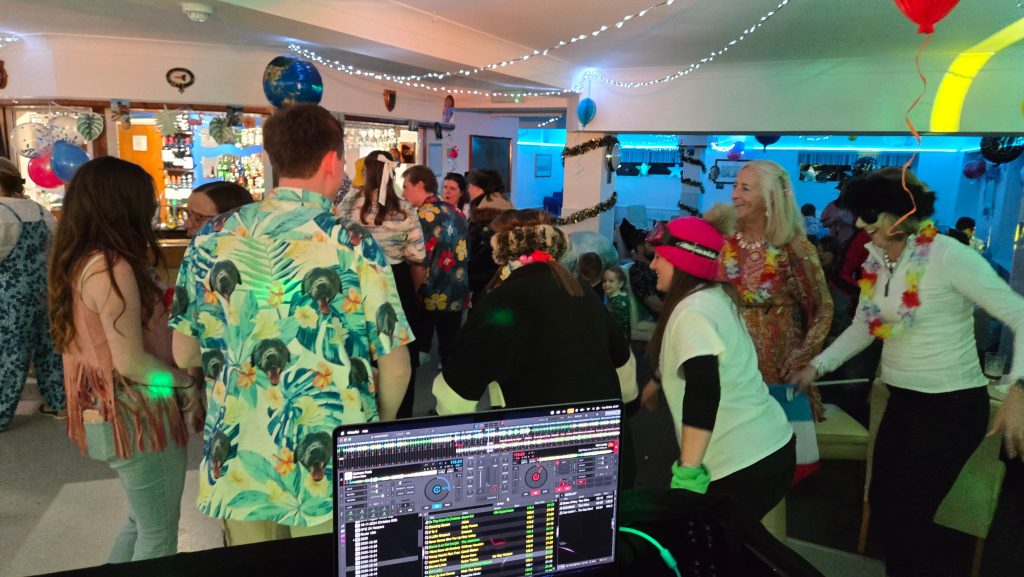 Packed dancefloor at a 30th birthday party with a DJ at Stokes Bay Sailing Club