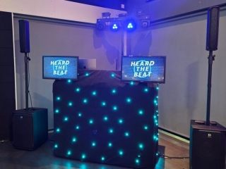 Professional DJ setup at Goals Portsmouth featuring speakers, lighting and branded DJ booth provided by Heard The Beat.