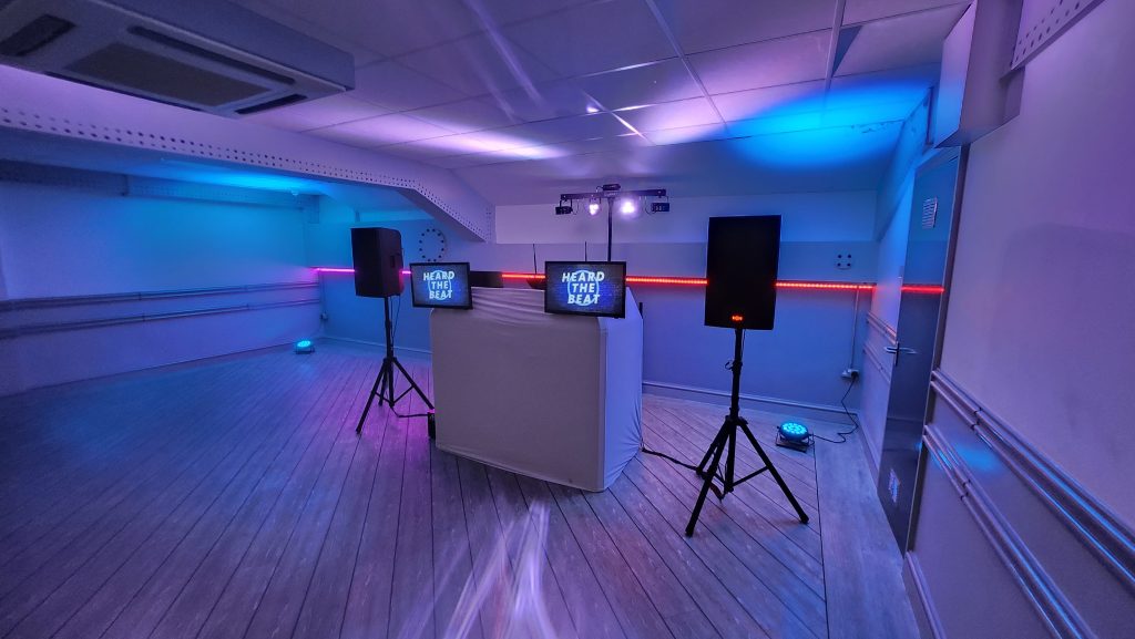 Professional DJ setup by Heard The Beat at the Royal Maritime Club Portsmouth with sound system and lighting ready for an evening reception