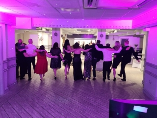 Guests dancing at a wedding reception at the Royal Maritime Club Portsmouth with DJ entertainment by Heard The Beat