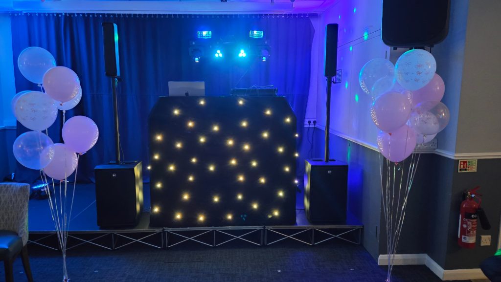 DJ setup by Heard The Beat at Carlton Club Portsmouth with professional sound system and blue event lighting.