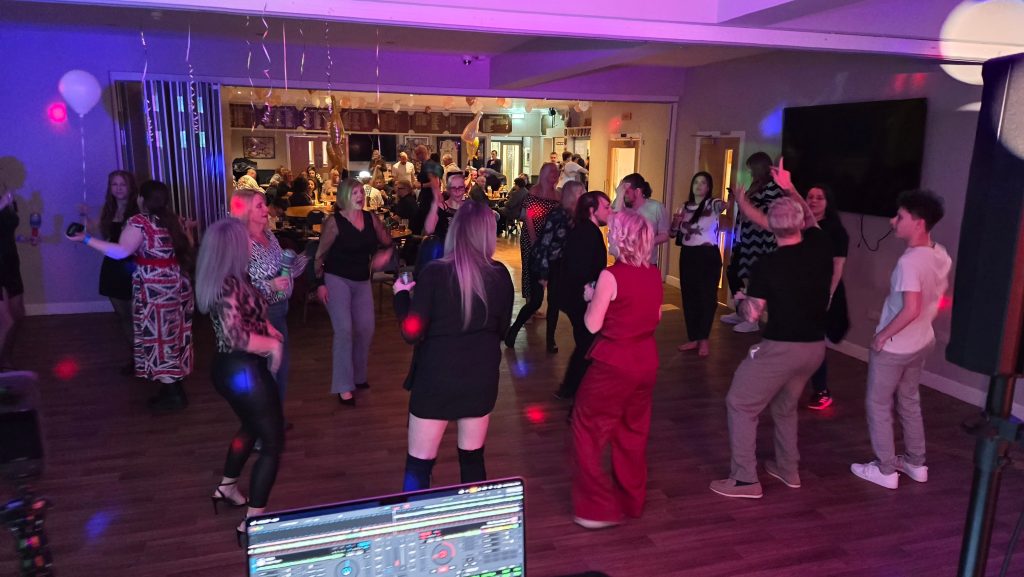 21st birthday party at Havant Rugby Club with packed dancefloor and guests dancing to DJ entertainment by Heard The Beat