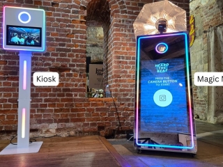 Magic Mirror photo booth and selfie kiosk photo booth by Heard The Beat set up at an indoor event venue.