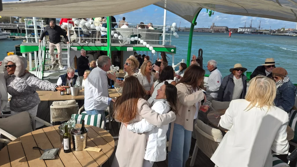 Party on The Lightship Gosport with DJ and guests dancing on a boat venue in Portsmouth Harbour