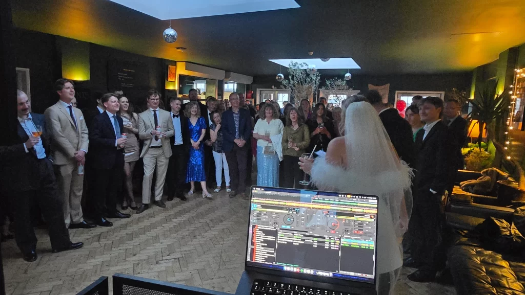 Wedding couple speech at Southsea Tennis Club Portsmouth with guests watching