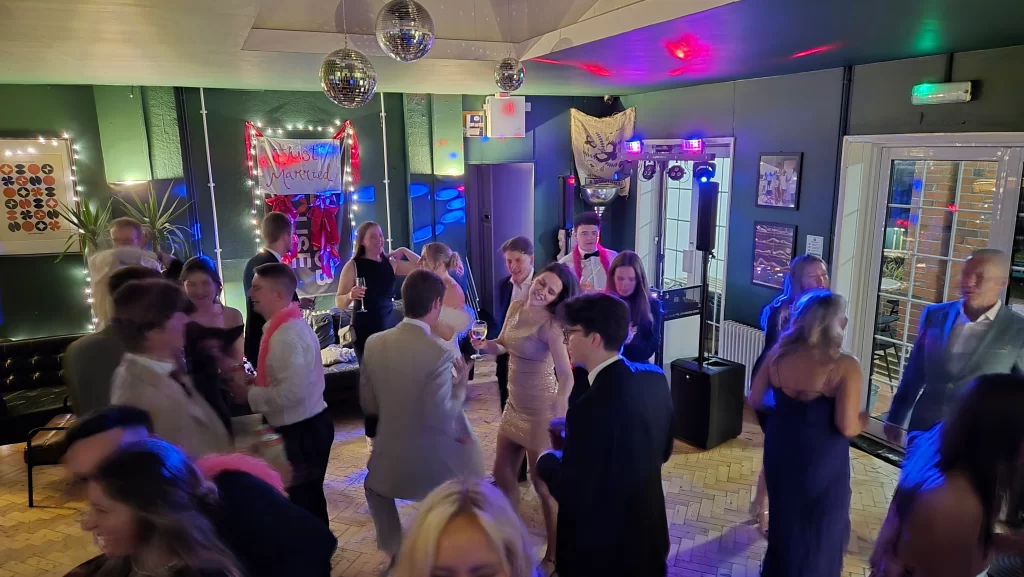 Wedding party with DJ and lighting at Southsea Tennis Club Portsmouth just married sign