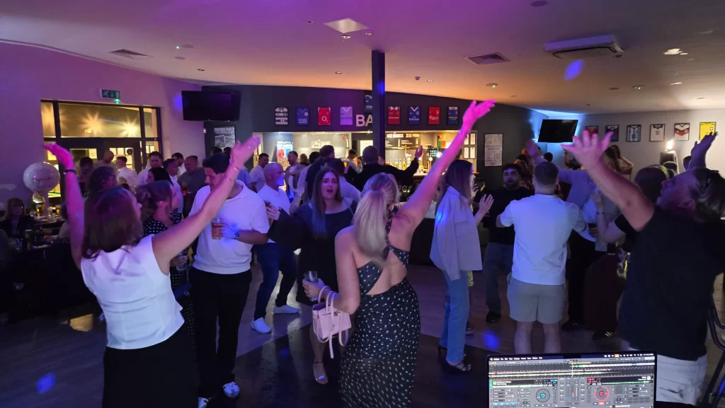 Guests dancing at a packed party dancefloor at Goals Portsmouth with DJ entertainment by Heard The Beat in Portsmouth.