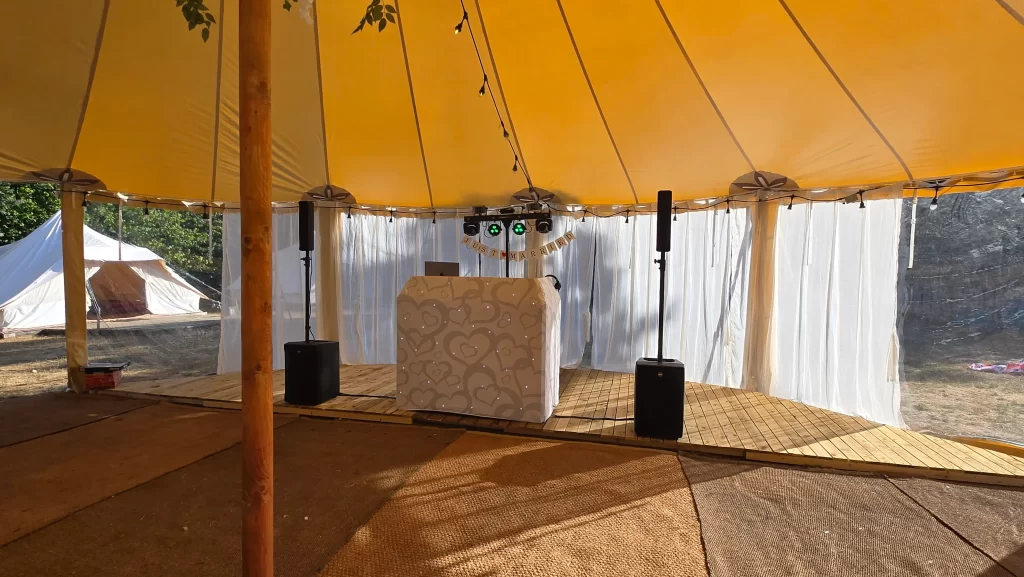 Wedding DJ setup inside the marquee at Bell Tent Glamping Southampton