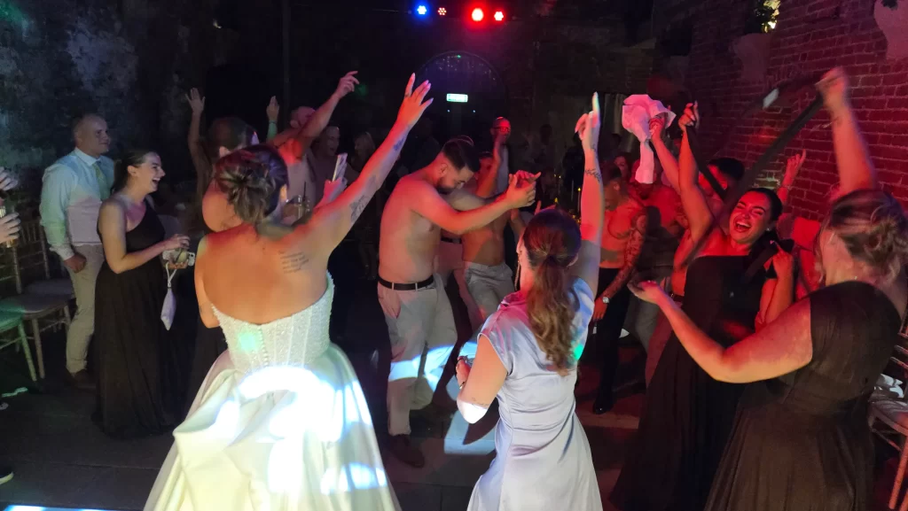 Bride and wedding guests dancing at The Square Tower in Portsmouth
